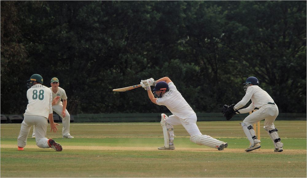 Kelly drives. Full stretch against the spinner.