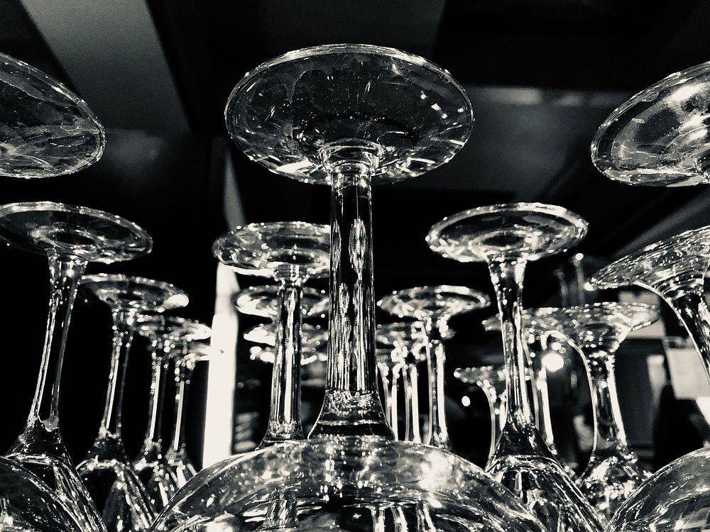 Aesthetic clear wine glasses bar.
