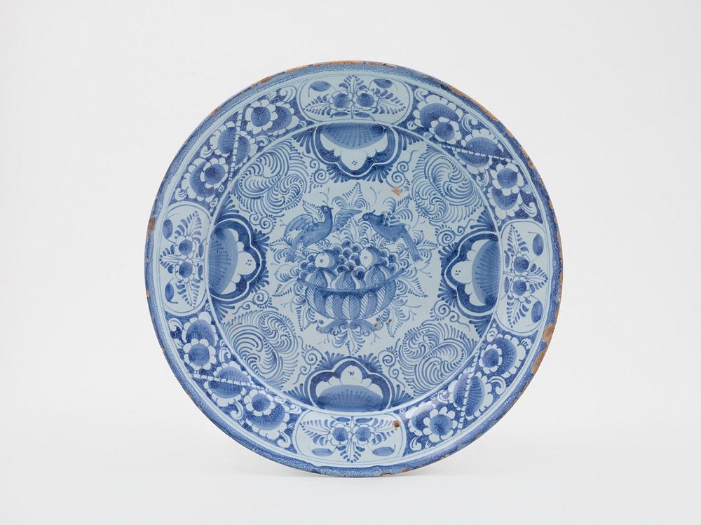 A plate with a blue floral decoration