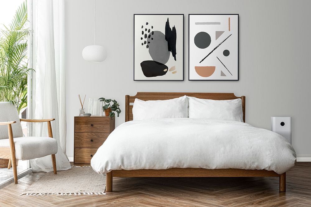 Picture frame mockup psd in a bright and clean modern bedroom