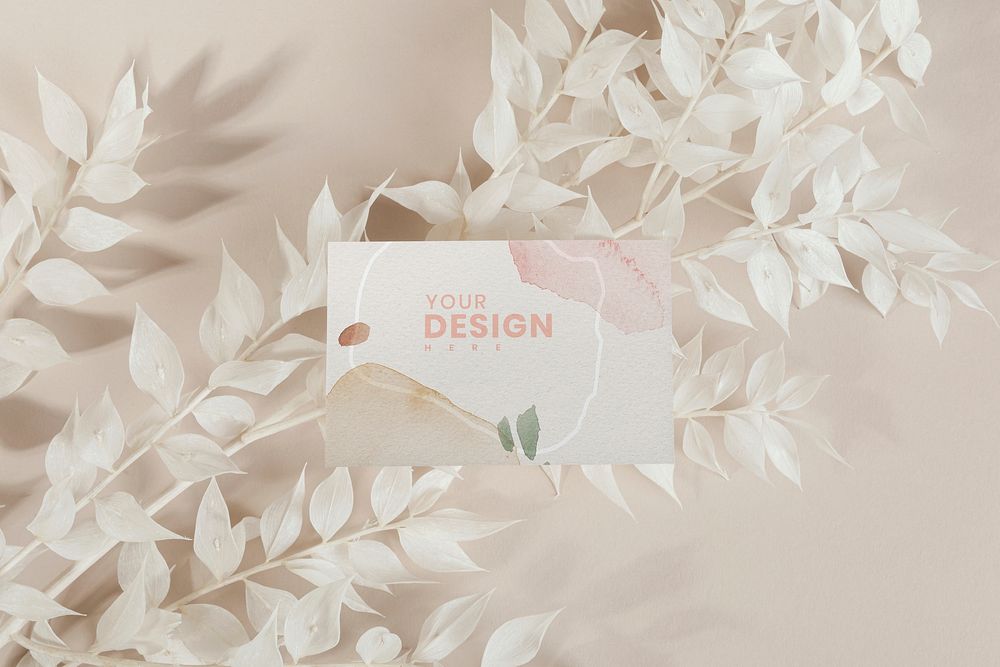 Business card on ornamental branches mockup