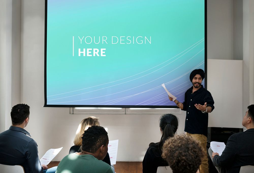 Student doing a presentation using a projector screen mockup