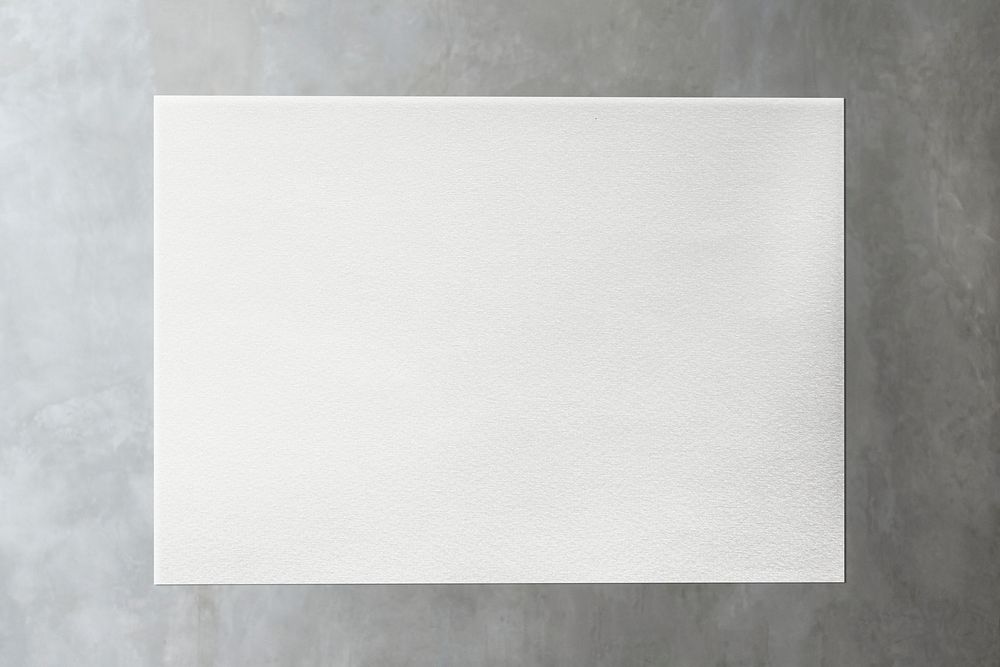 White paper on a gray marble background