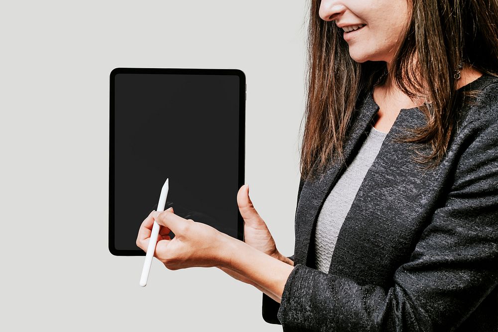 Happy woman using a tablet