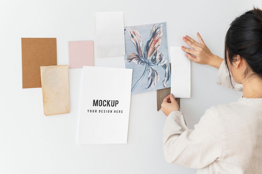 Woman decorating the wall with card mockup