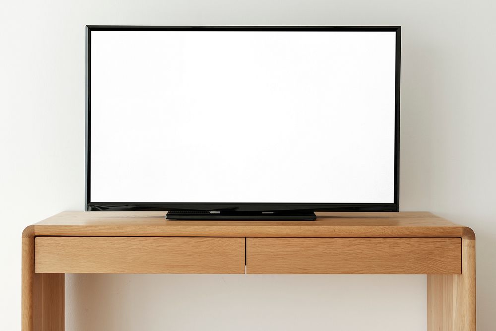 Smart TV screen mockup psd on a wooden table