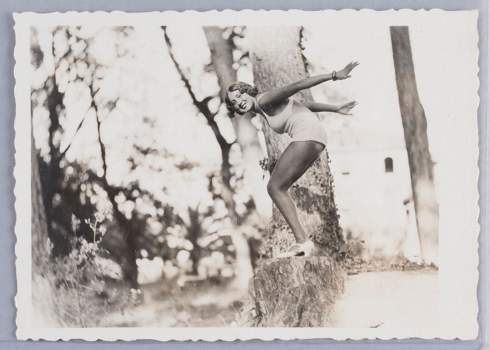 Untitled (Woman in Swimsuit in Diving Pose on Treestump)