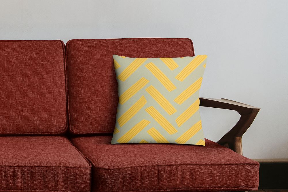 Cushion cover pillow mockup psd with abstract pasta food pattern on the sofa home decor