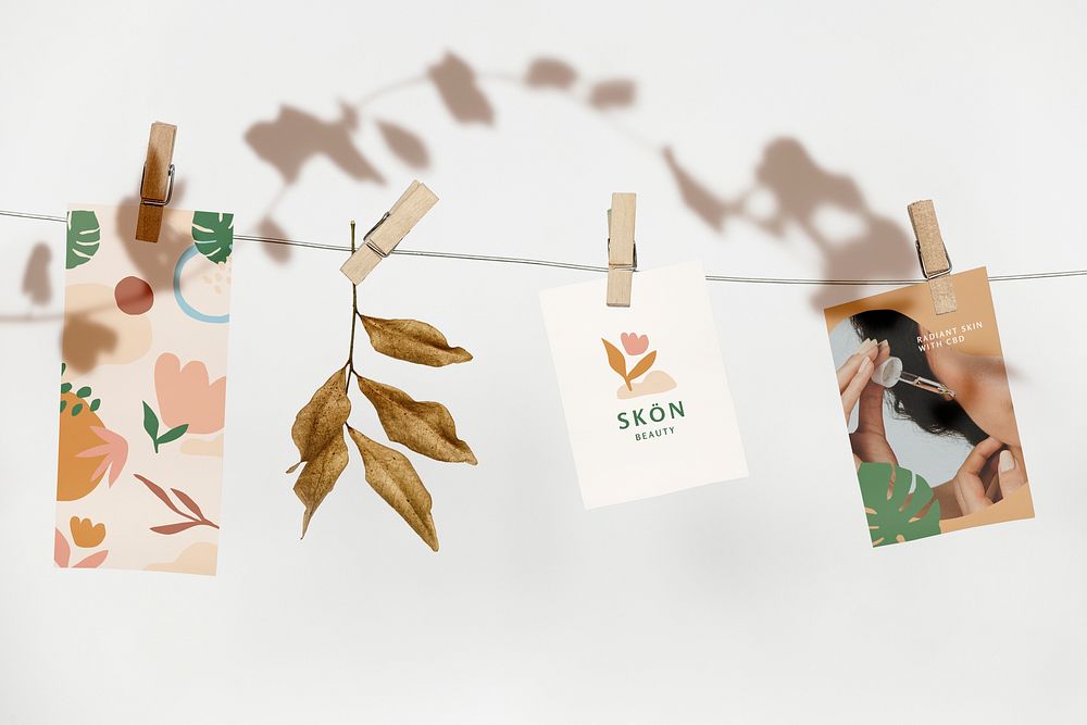 Papers mockup, hanging on rope with paper clips psd