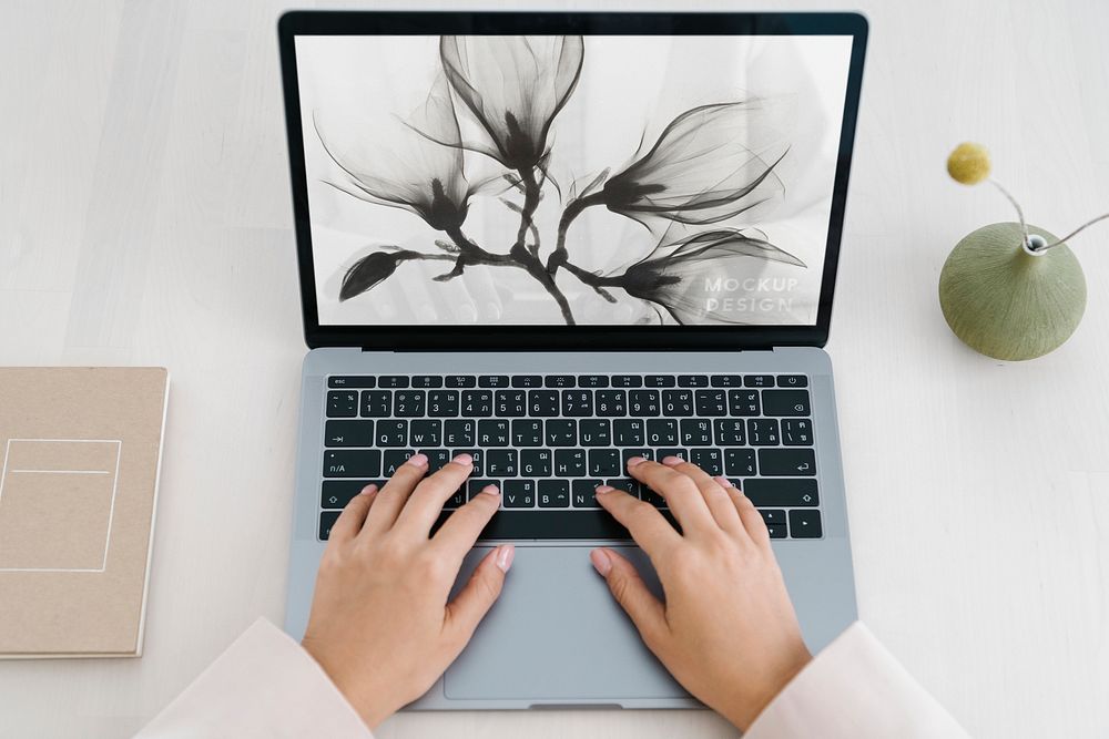 Woman using a laptop mockup