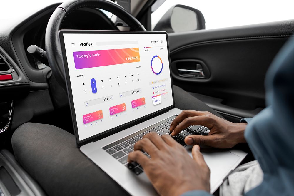 Laptop screen mockup with online banking app in a self driving car psd