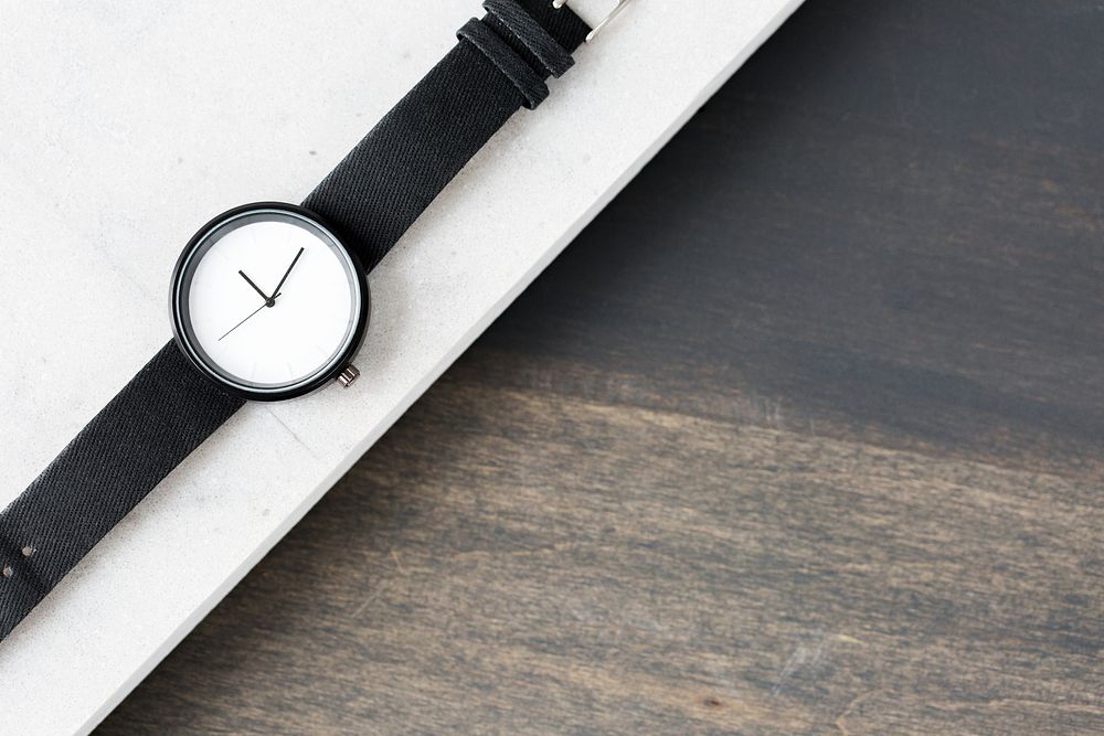 Classic and simple black and white wrist watch with a canvas strap