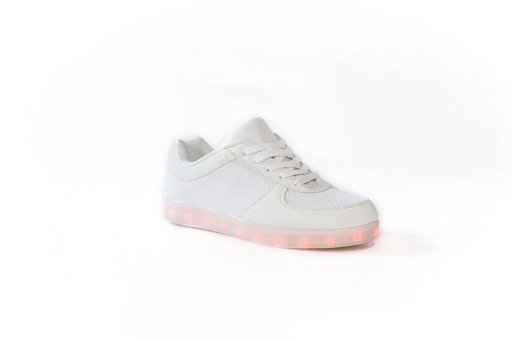 White sneaker with pink LED lights.