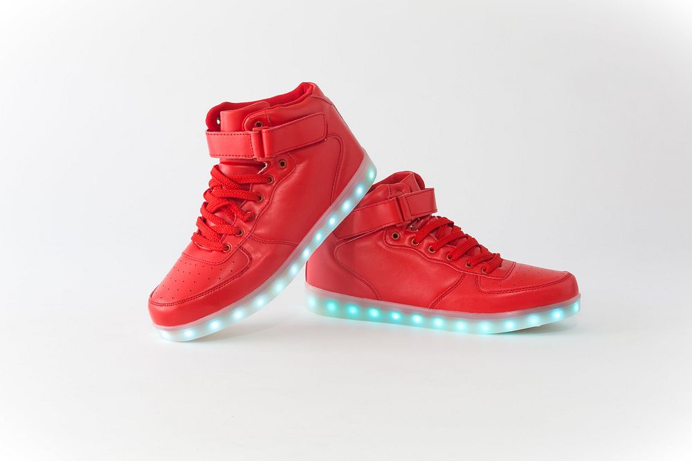 Red sneakers with LED lights.