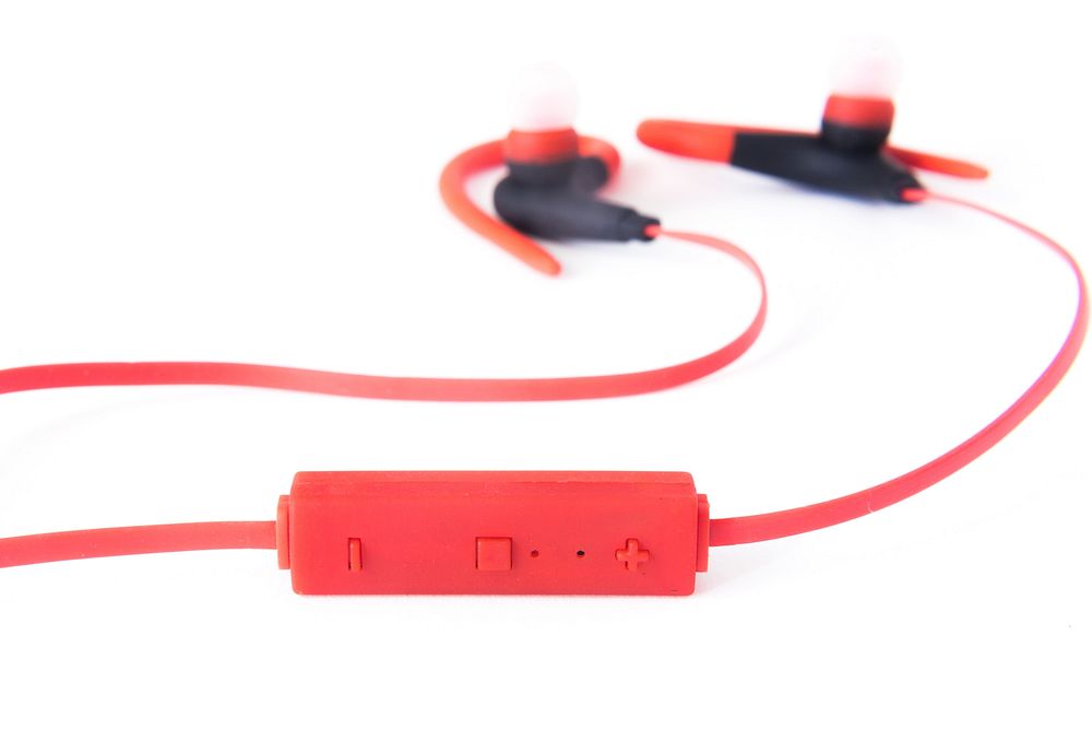 Red headphones controls on cord.