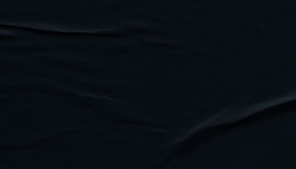 Black paper textured background