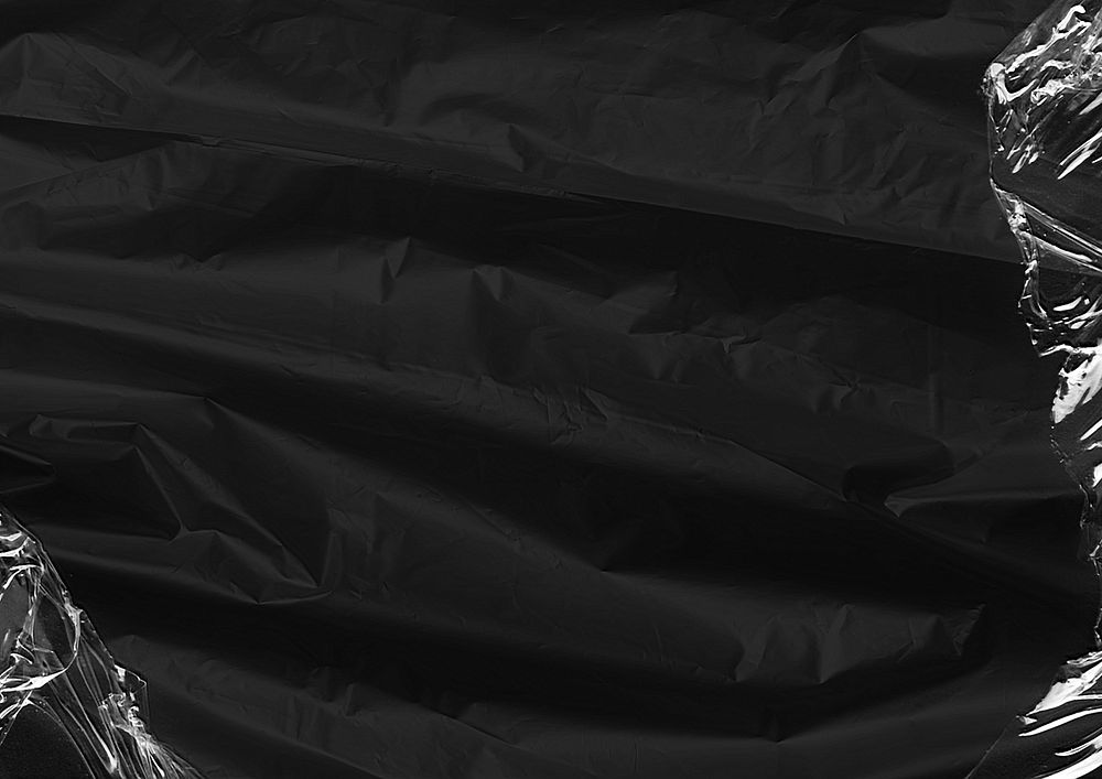 Black fabric texture background, plastic wrap border