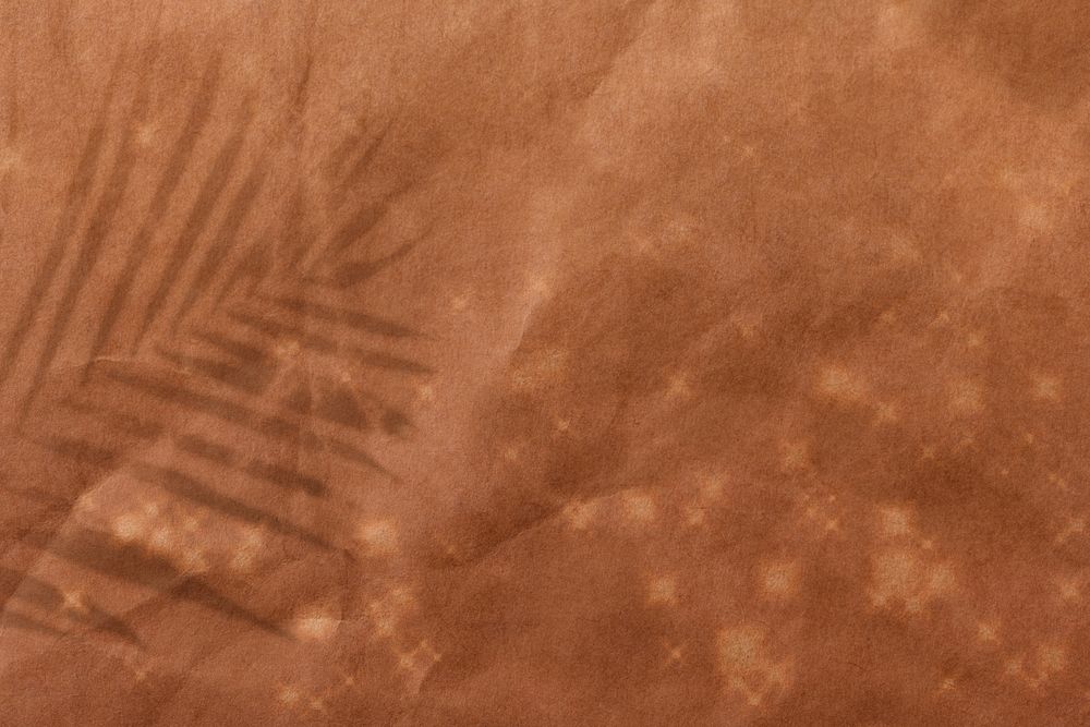 Brown sparkly background, leaf shadow border