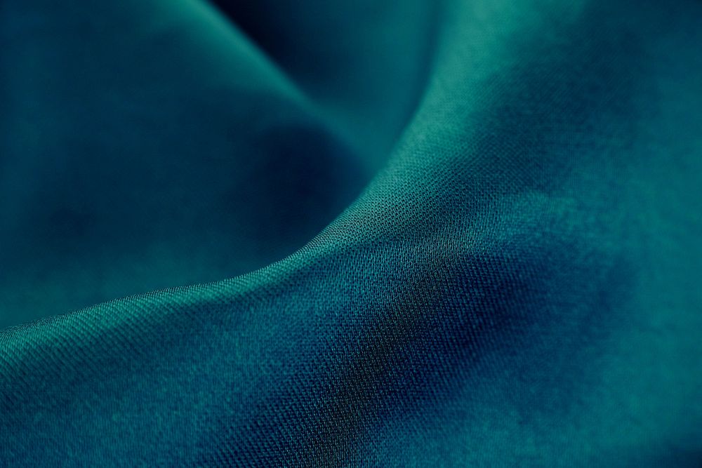 Dark green fabric background