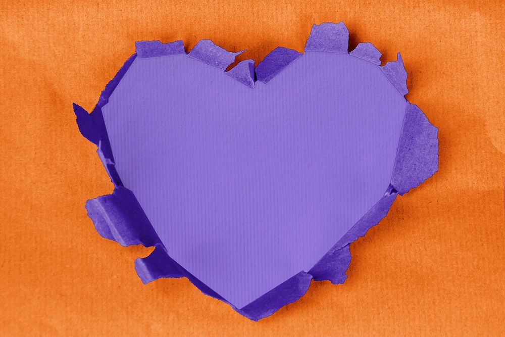Heart in paper hole background