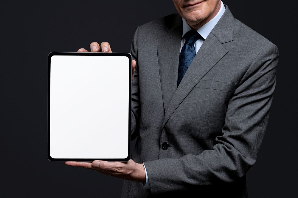 Tablet screen mockup psd with businessman presenting