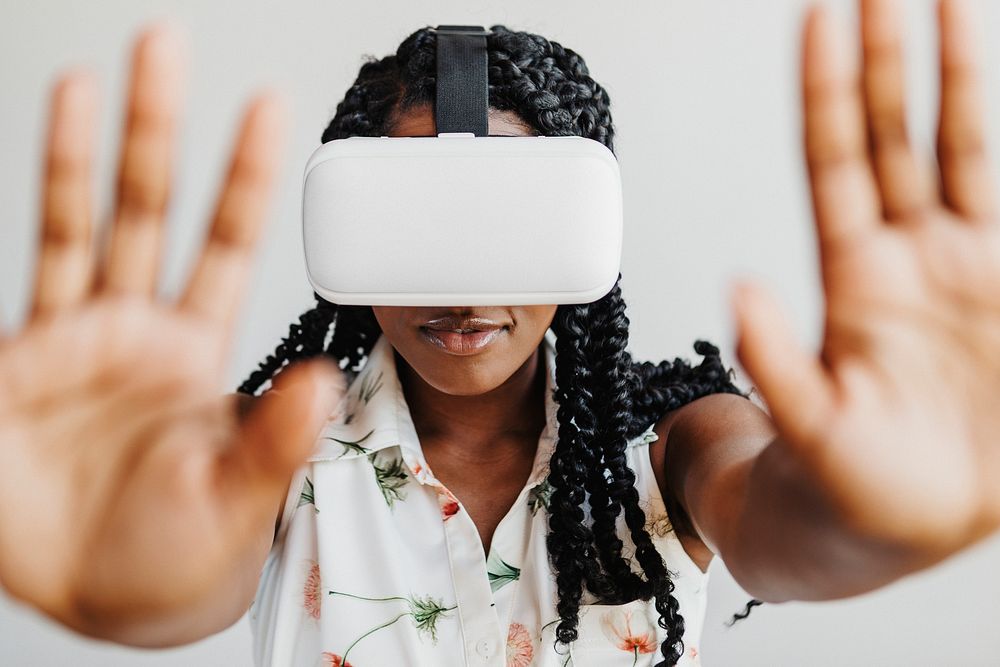 Black woman enjoying a  VR headset mockup