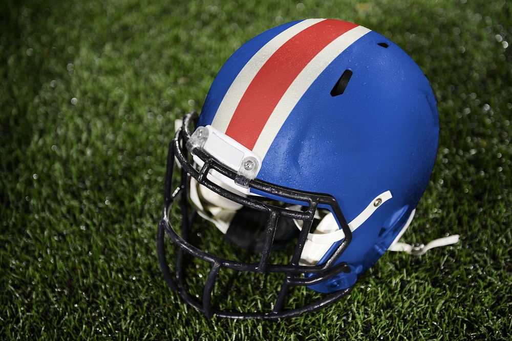 Blue football helmet on field