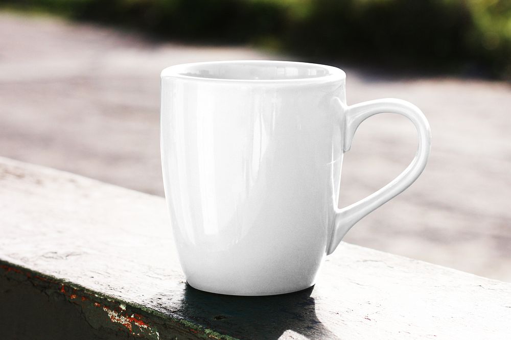 White coffee mug on wooden table