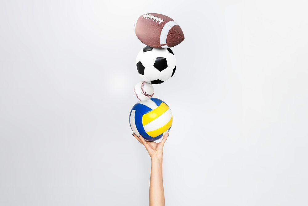 Hand holding sports balls