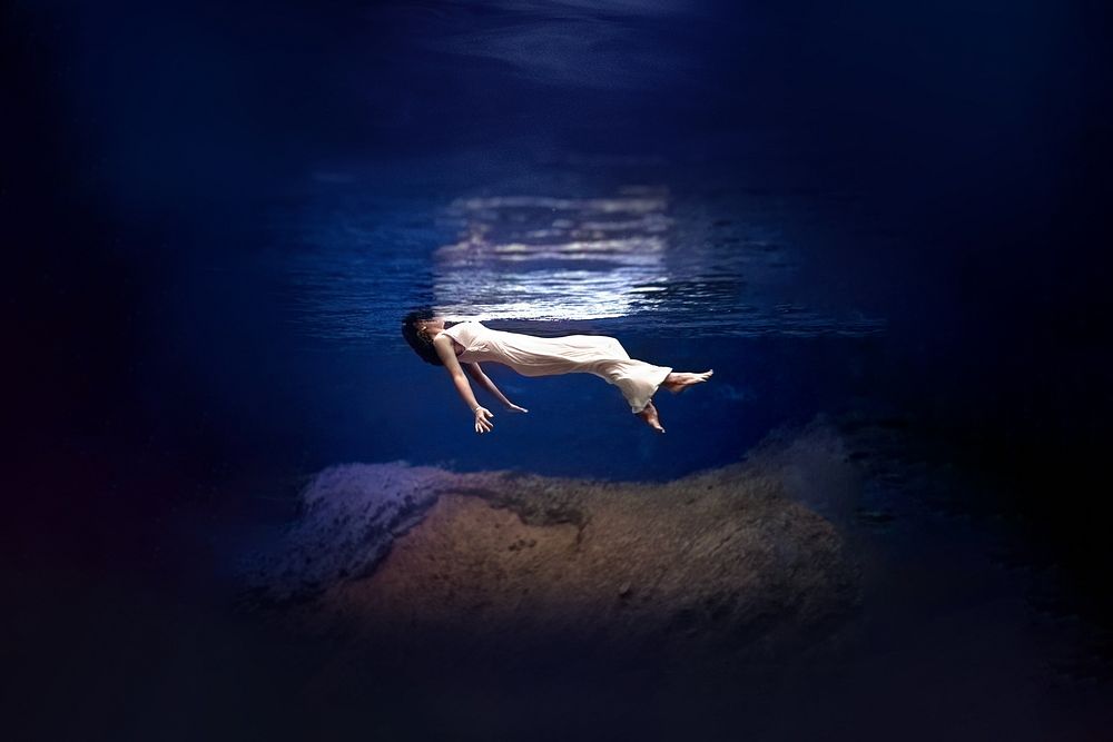 Woman floating underwater background. Remixed by rawpixel. 