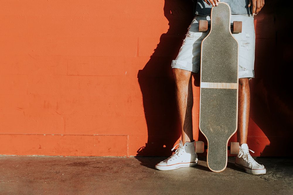 Man with longboard background