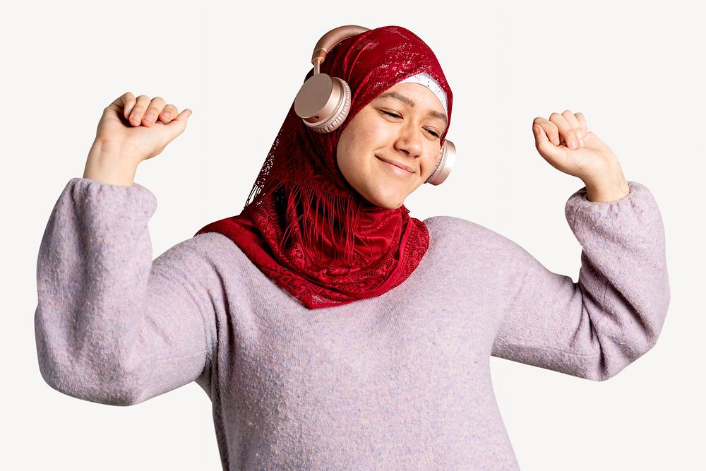 Muslim woman listening to music isolated image