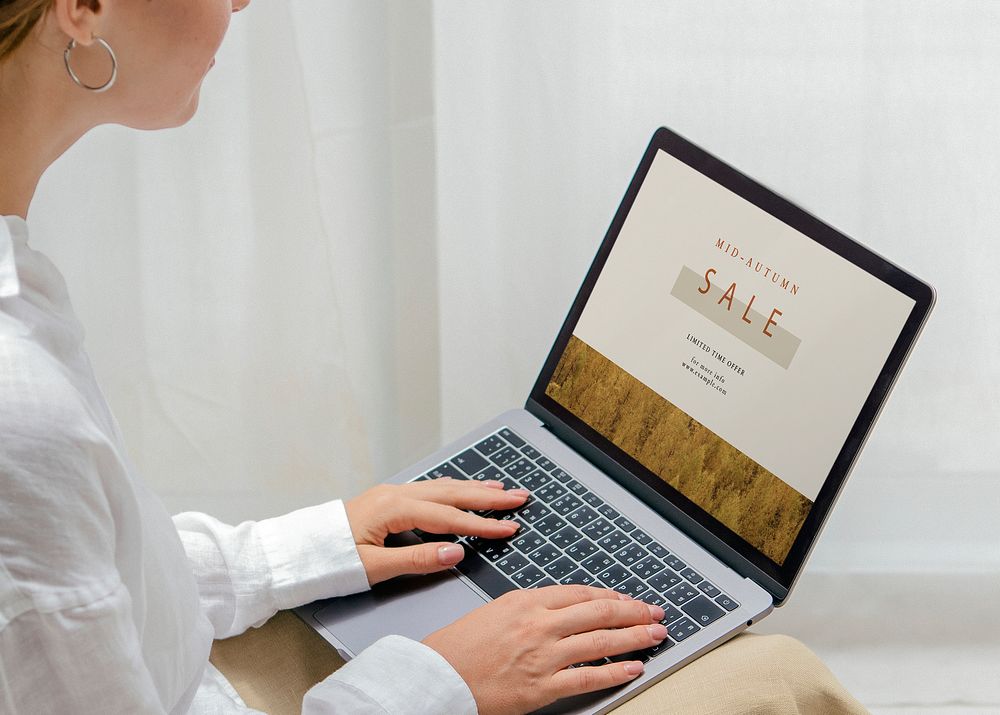 Woman using a laptop mockup