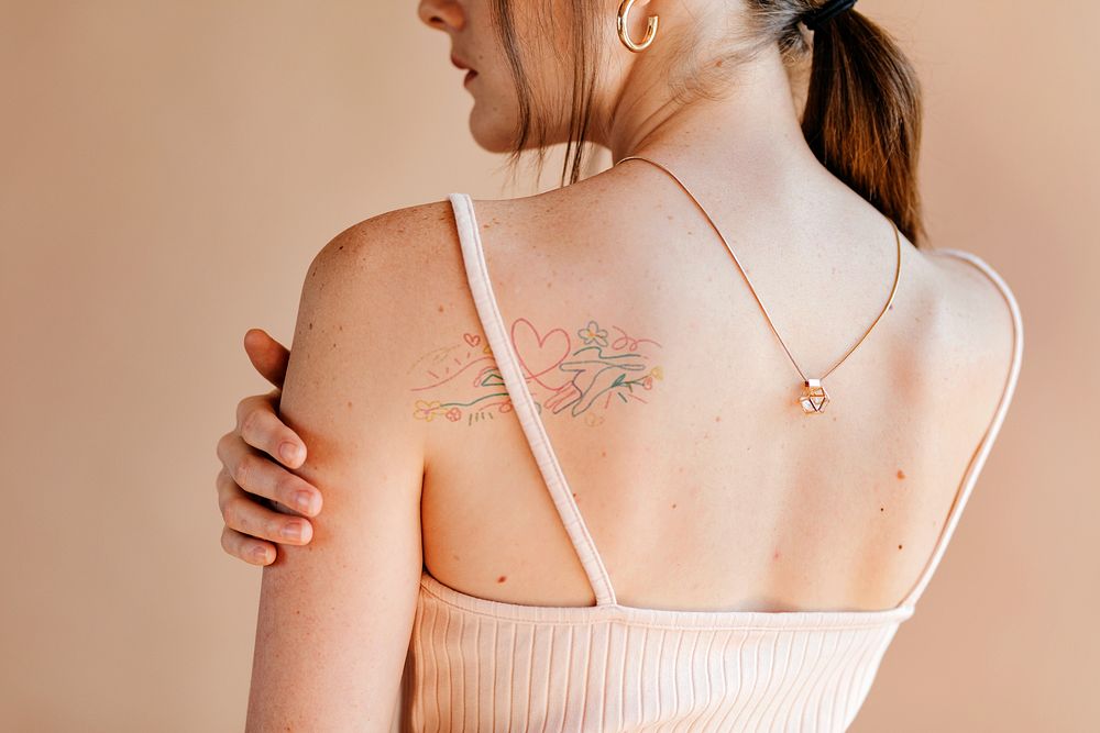 Floral tattoo on woman's back