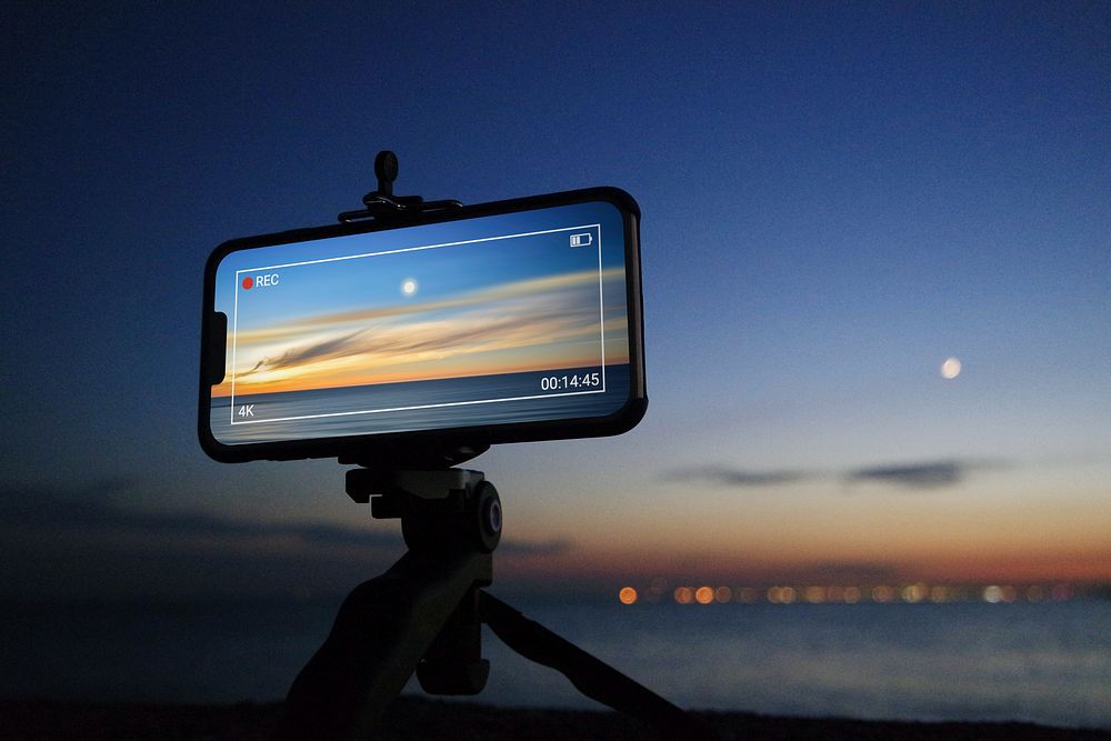 Mobile phone recording sunrise video