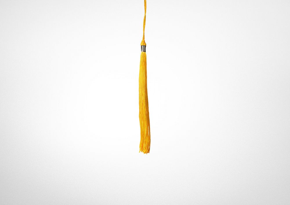 Yellow tassel background, graduation cap image