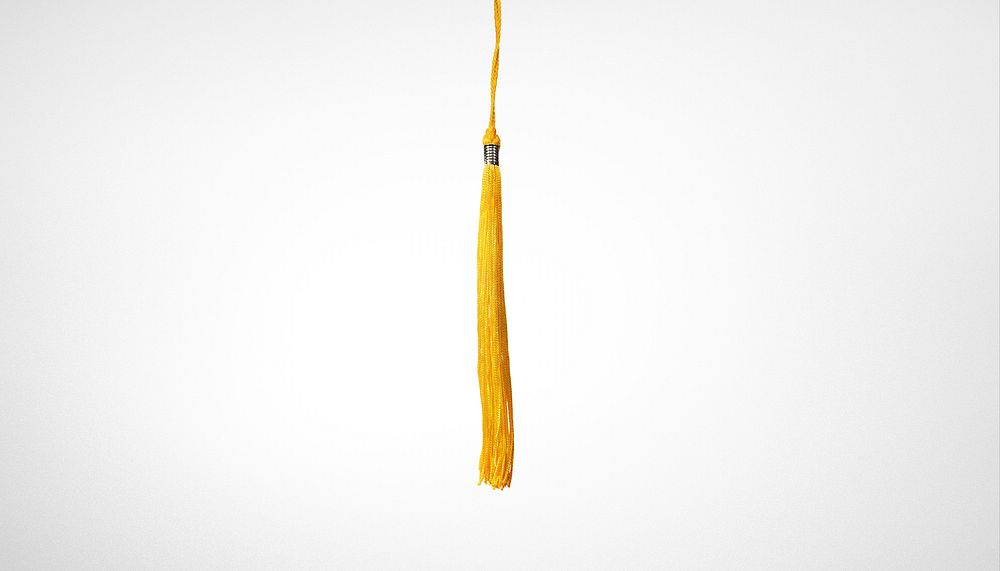 Yellow tassel background, graduation cap image