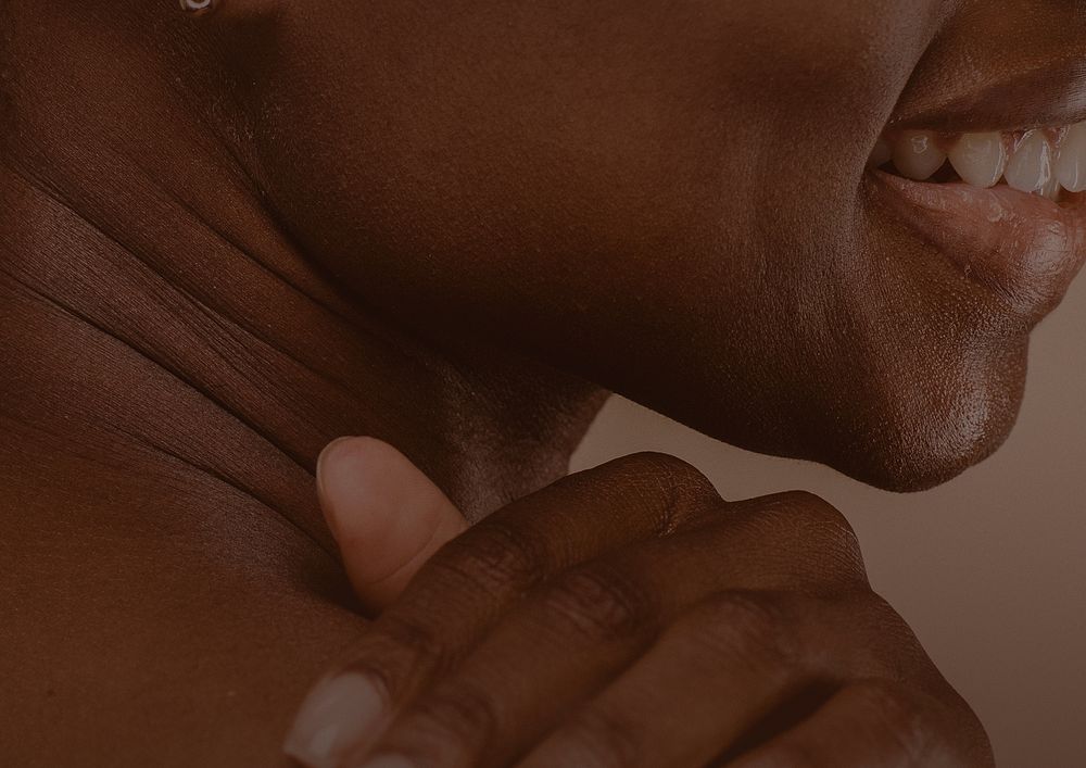 Black woman's skin background, beauty close up image