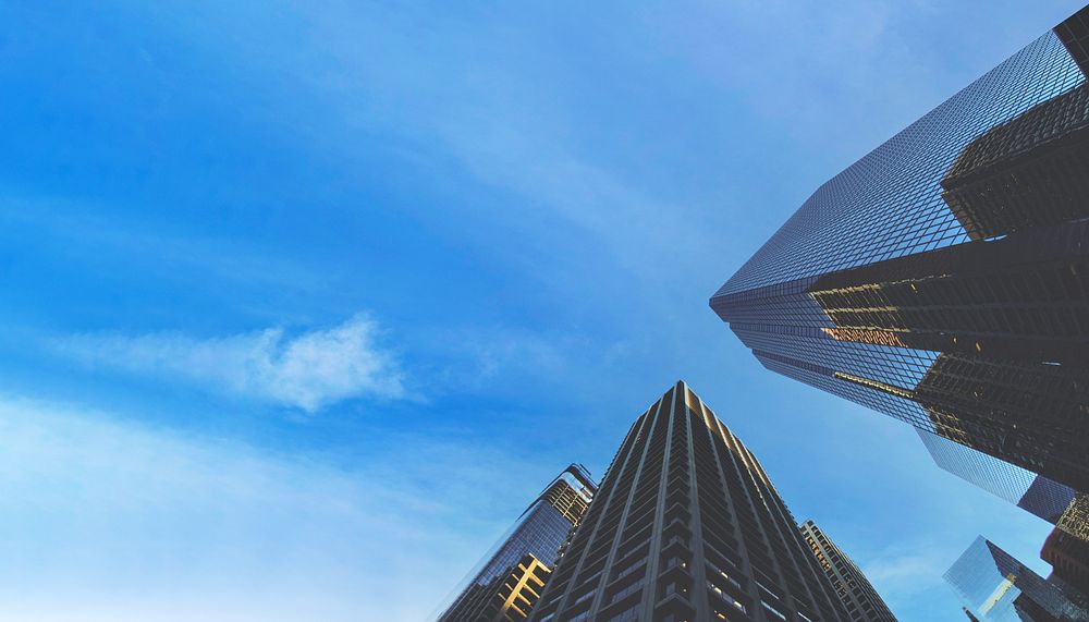 Low-angle building border background, blue sky image