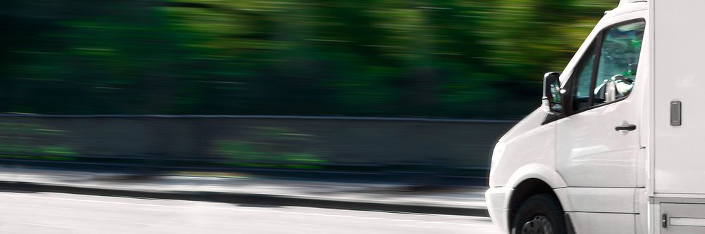 White delivery truck background, countryside drive