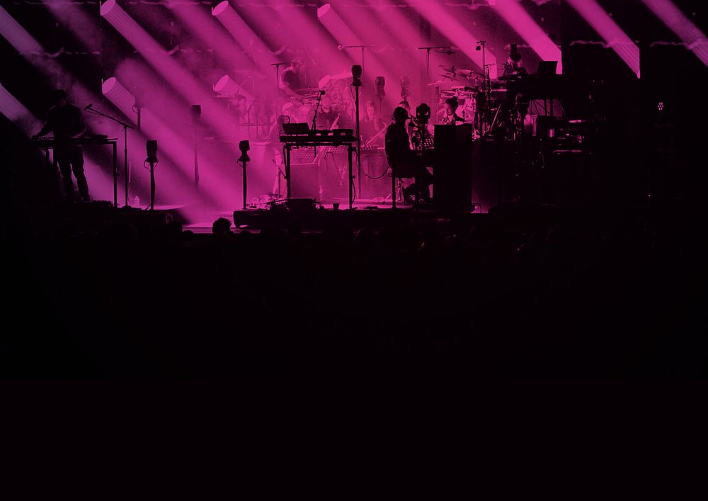 Silhouette concert, pink light background