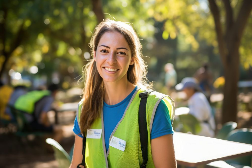 Smile volunteer portrait outdoors. 