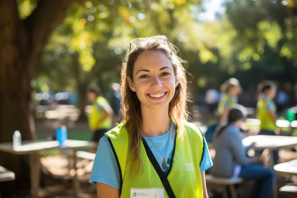 Smile volunteer portrait outdoors. 