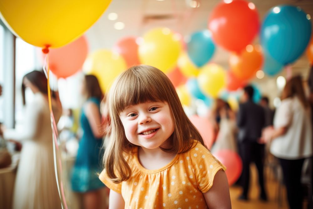 Down syndrome girl at birthday party