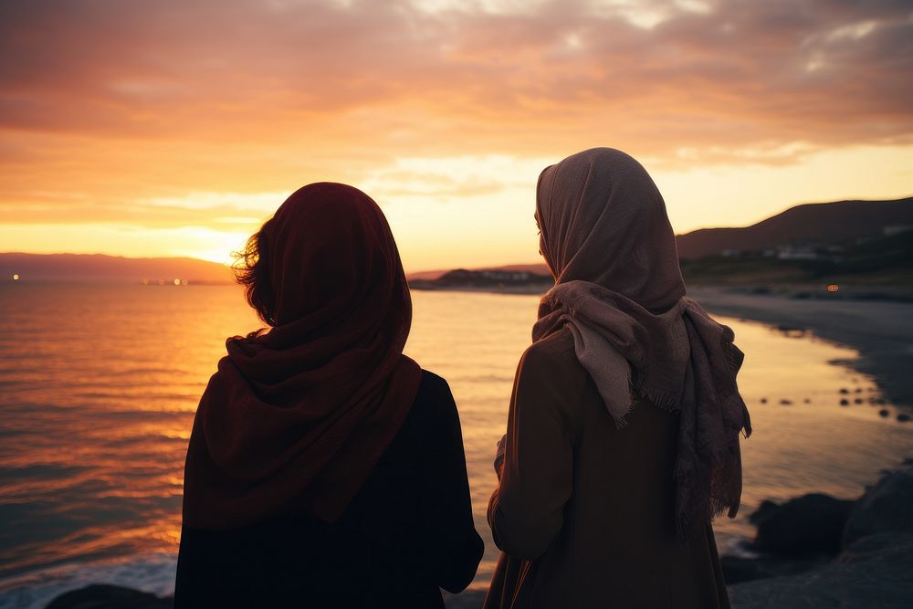 Muslim women at a beach AI generated image