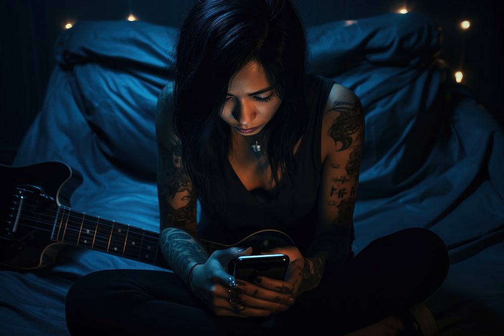 Depressed punk woman using phone at night AI generated image
