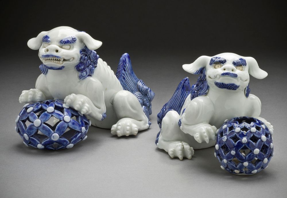 Pair of Okimono in the Form of Chinese Lions on Pierced Balls