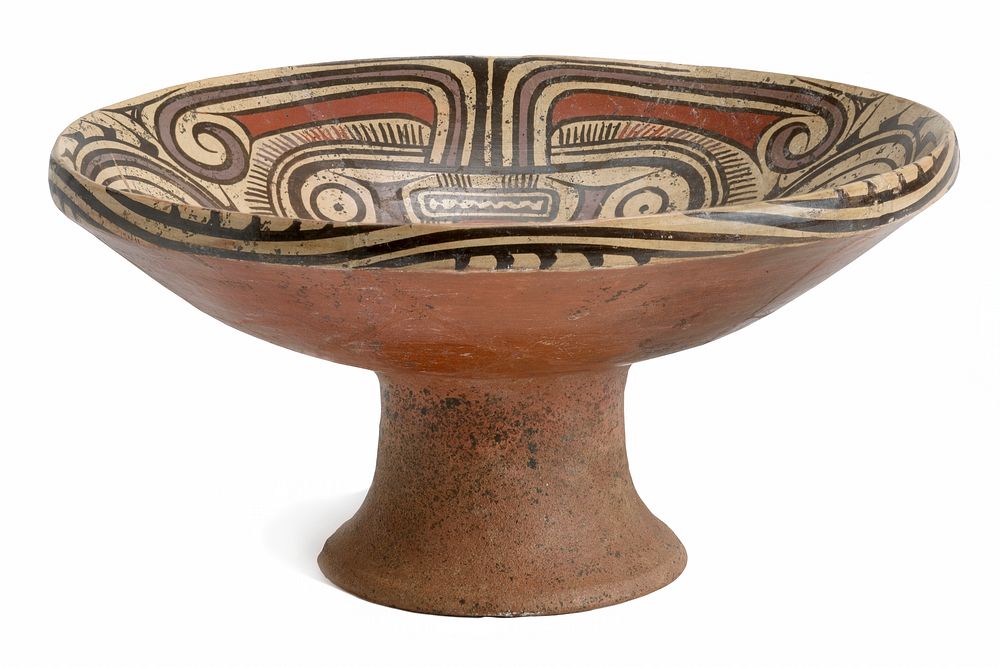 Pedestal dish with swirling design