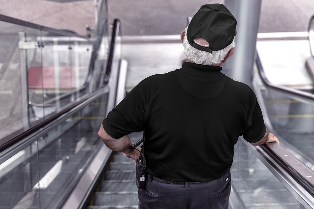 Security guard on escalator