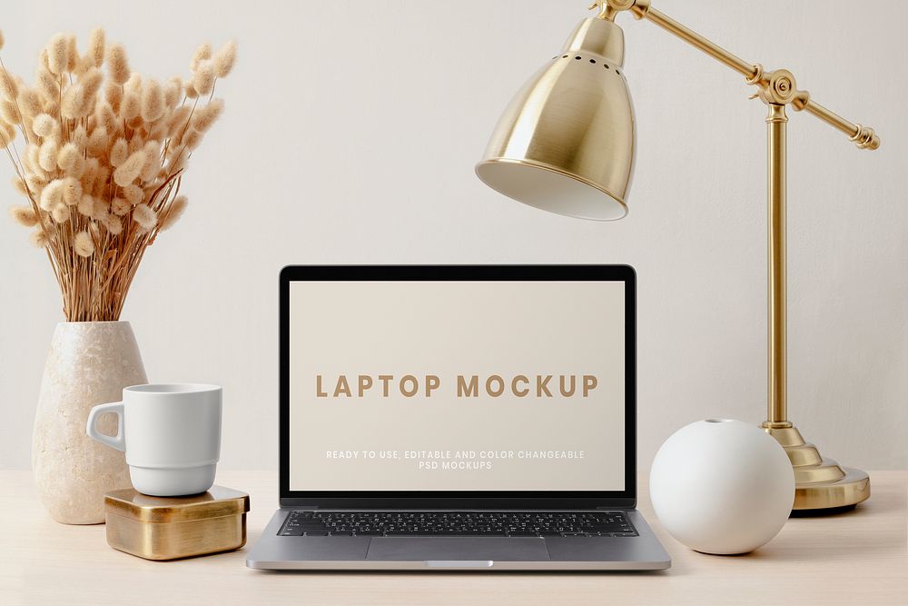 Laptop screen mockup psd, aesthetic workspace, luxurious brass decoration